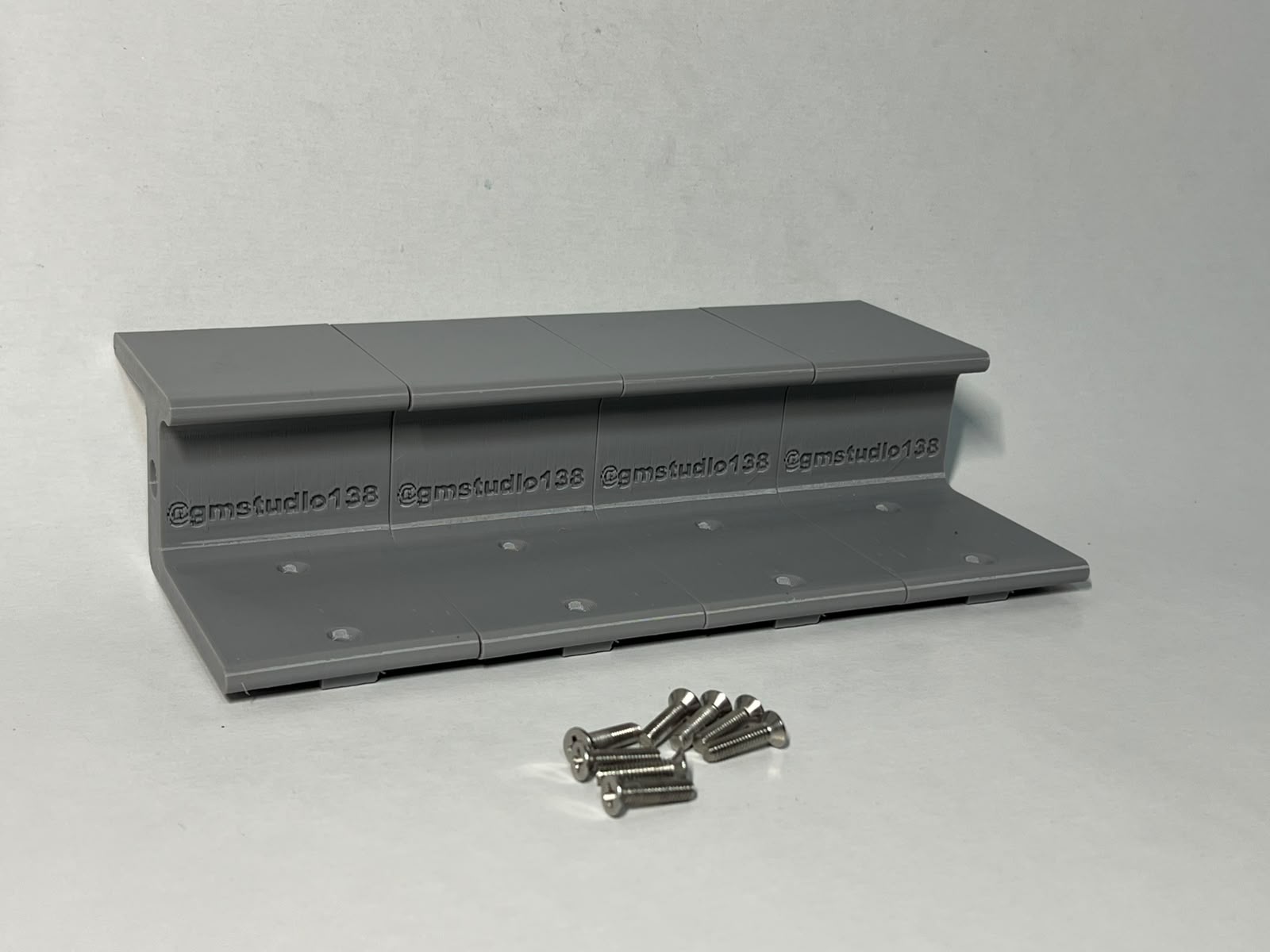 Gray interchangeable Shredmill obstacle with mounting screws